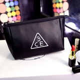 韩国高档化妆包手包式收纳包时尚个性黑色pu皮3ce手拿包防水 包邮