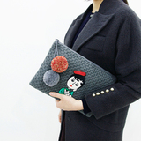 韩版新款女包针织毛球编织手拿小收纳包时尚气质手抓潮包可爱包包