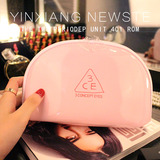 人气化妆包韩国3CE粉色漆皮包便携整理收纳包洗漱包小号手包式