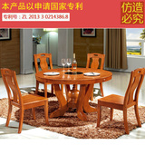 圆形餐桌椅组合橡木饭桌带电磁炉现代中式实木桌子高档功能餐桌