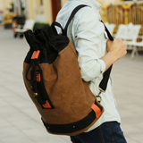韩版潮流帆布包男包中学生休闲双肩包背包书包户外运动桶包