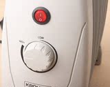 正诺迷你家用电热油汀取暖器小电暖气579片办公恒温暖脚电暖器k