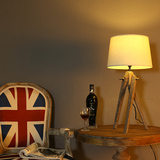 特价北欧灯罩实木扭转三角台灯客厅卧室床头台灯LED灯节能灯包邮