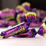 热销 俄罗斯进口糖果果仁夹心巧克力糖酥糖喜糖零食紫皮糖500克