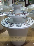 上海市特价烤漆 眼镜柜子中岛眼镜货架 化妆品柜圆形服装中岛现货