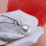 亮丽珍珠特价9mm一10mm天然淡水米形滴水珍珠吊坠项坠925银