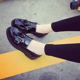 韩版潮流女鞋漆皮流苏铆钉一脚蹬懒人黑色皮鞋平底跟软皮单鞋防滑