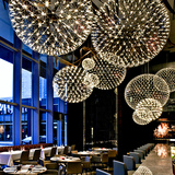 现代工艺时尚造型设计师餐厅灯创意卖场复式楼梯组合客厅圆形吊灯