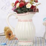 白色手工陶瓷花器 水壶花插花器热卖花艺工艺品古典水笙花瓶