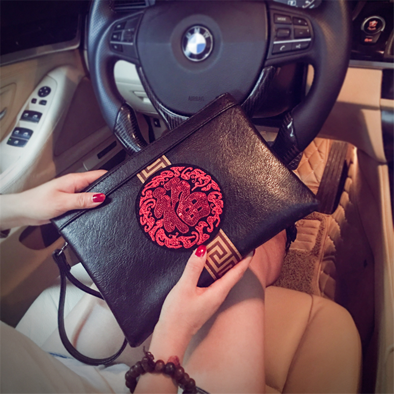 Hong Kong Chinese style personality Korean version of the mens hand bag fashion hand bag handbag envelope bag wrist bag