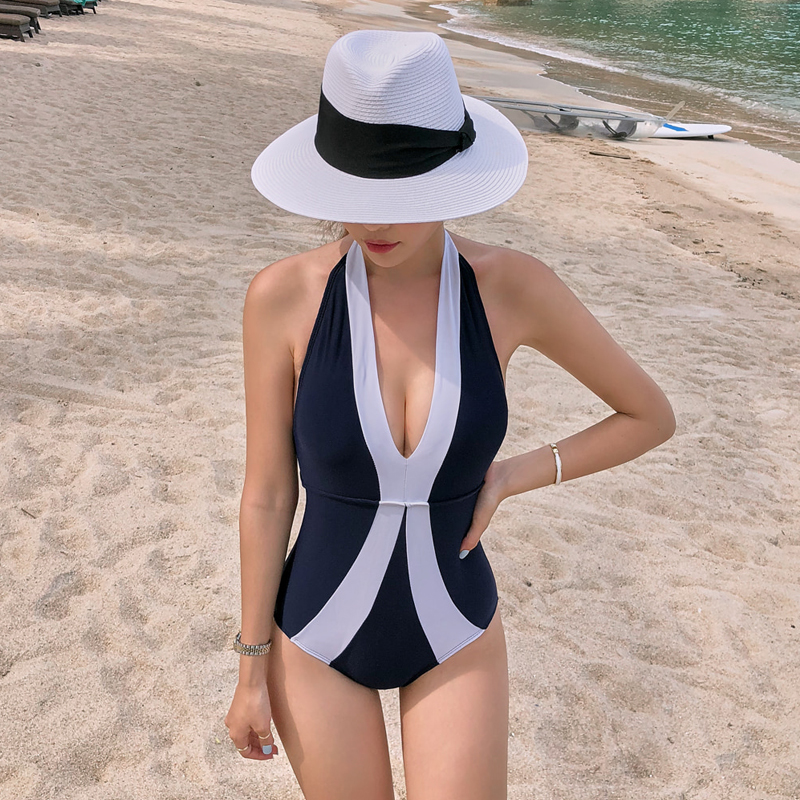 Hai Shuman European and American black jumpsuit female feeling deep V belly thin size chest gathered vacation bikini