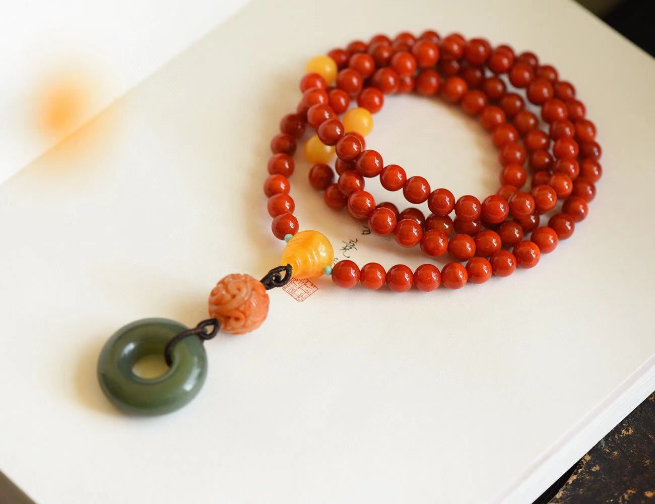 Nanhongs beads are ruddy and shiny with yellow honey wax with beaded honey wax